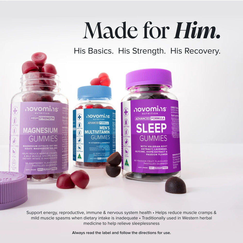 Three Novominis gummy supplement bottles arranged on a white background with loose gummies scattered in front. The bottles are labeled Magnesium Gummies, Men's Multivitamin Gummies, and Sleep Gummies, with the text 'Made for Him.