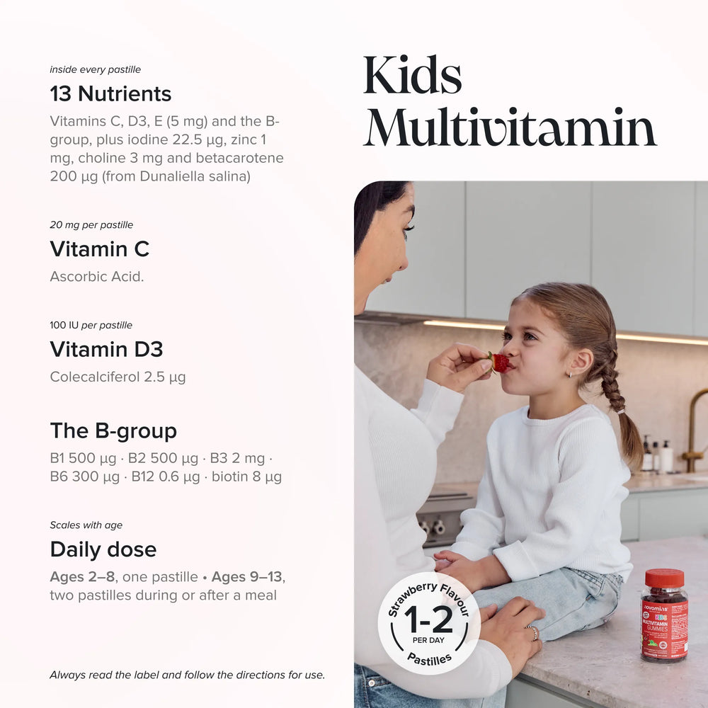 A parent handing a gummy to a child in a kitchen beside a Kids Multivitamin Gummies bottle, with the 13 nutrients per pastille listed