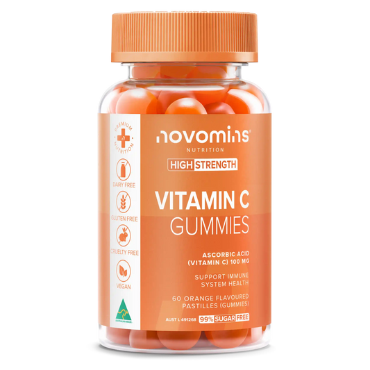A bottle of Novomins Vitamin C Gummies with orange capsules visible through the clear container and an orange label, set against a plain white background.