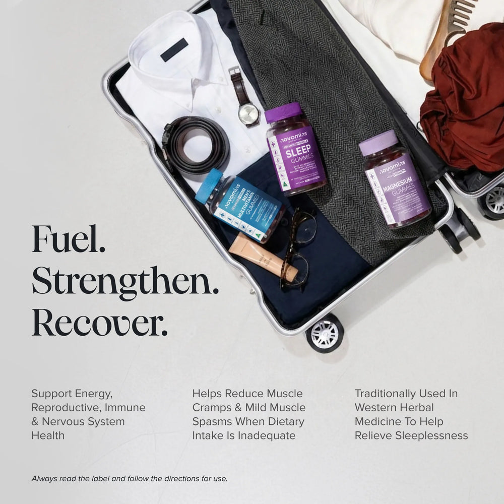 An open suitcase on a light gray background containing a white shirt, a watch, a black cord, a blue box, and two purple supplement bottles, with large text reading 'Fuel. Strengthen.